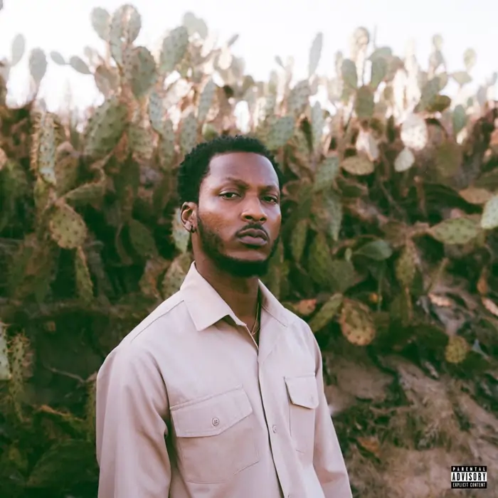 Image of Atown TSB wearing a light-colored shirt stands in front of a large cactus patch, looking directly at the camera. artwork for Atown TSB - Intensive Care [FULL EP]
